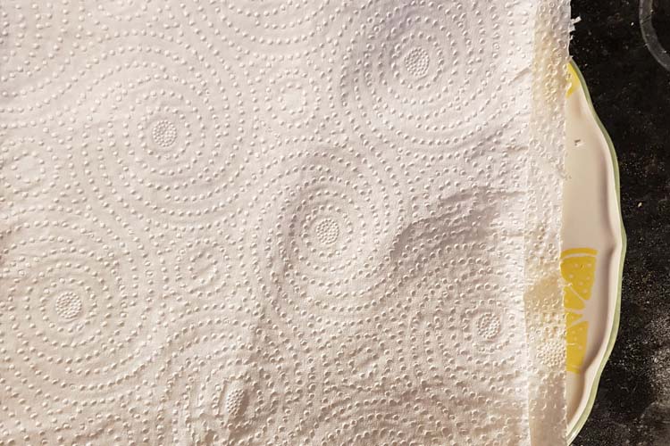 Step 1 Lay kitchen towel on plate